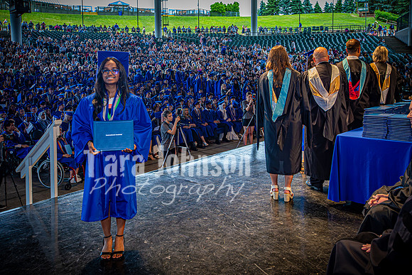2024 IA Graduation - Diploma with audience behind - TJP (169 of 178)