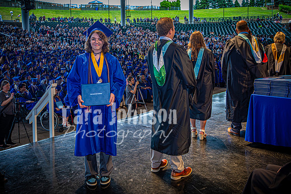 2024 IA Graduation - Diploma with audience behind - TJP (153 of 178)