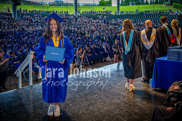 2024 IA Graduation - Diploma with audience behind - TJP (160 of 178)