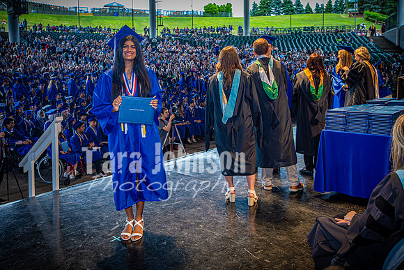 2024 IA Graduation - Diploma with audience behind - TJP (102 of 178)