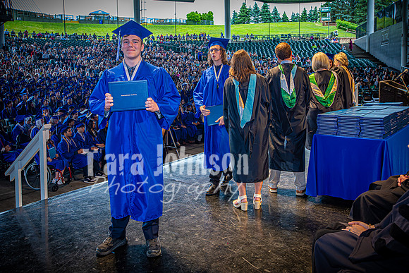 2024 IA Graduation - Diploma with audience behind - TJP (60 of 178)