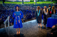 2024 IA Graduation - Diploma with audience behind - TJP (166 of 178)