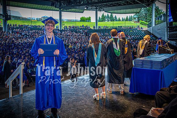 2024 IA Graduation - Diploma with audience behind - TJP (2 of 178)