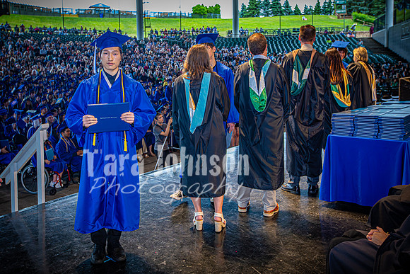 2024 IA Graduation - Diploma with audience behind - TJP (65 of 178)