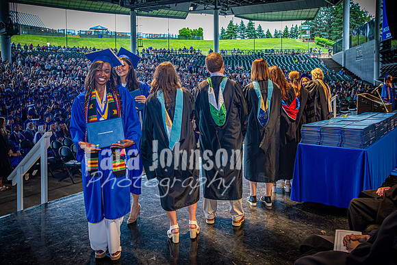 2024 IA Graduation - Diploma with audience behind - TJP (10 of 178)
