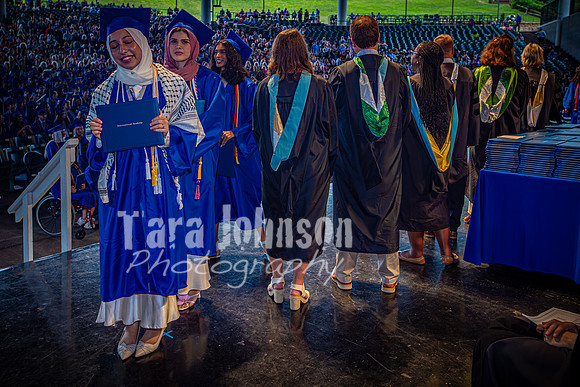 2024 IA Graduation - Diploma with audience behind - TJP (50 of 178)