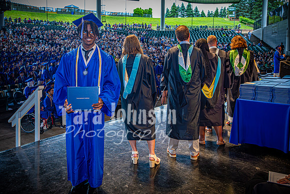 2024 IA Graduation - Diploma with audience behind - TJP (48 of 178)