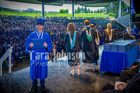 2024 IA Graduation - Diploma with audience behind - TJP (6 of 178)