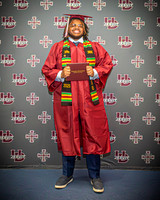 25 U of D Graduation - Angle #1A - Logo Sign (Full Pose)