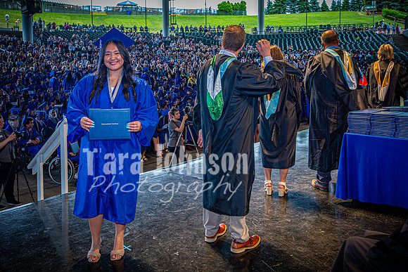 2024 IA Graduation - Diploma with audience behind - TJP (145 of 178)