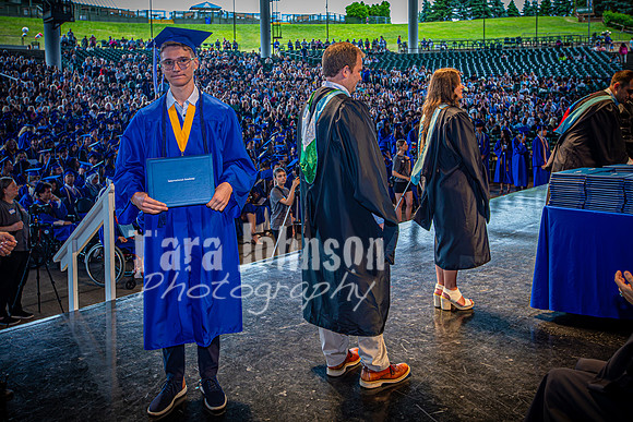 2024 IA Graduation - Diploma with audience behind - TJP (155 of 178)