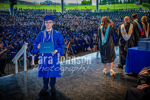 2024 IA Graduation - Diploma with audience behind - TJP (159 of 178)