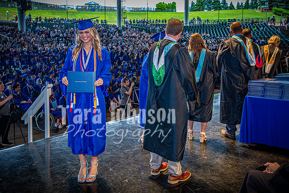 2024 IA Graduation - Diploma with audience behind - TJP (128 of 178)