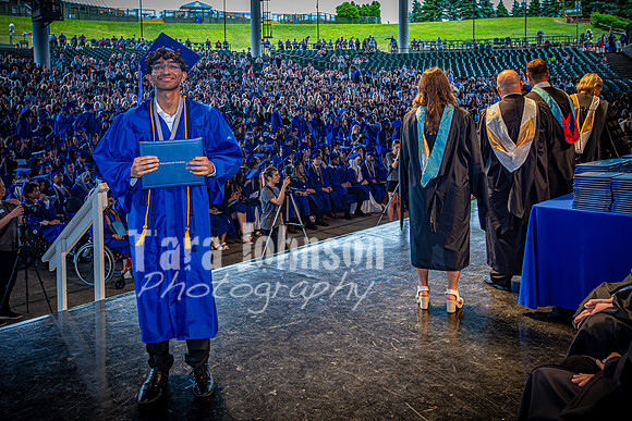 2024 IA Graduation - Diploma with audience behind - TJP (162 of 178)