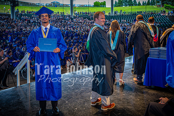 2024 IA Graduation - Diploma with audience behind - TJP (129 of 178)