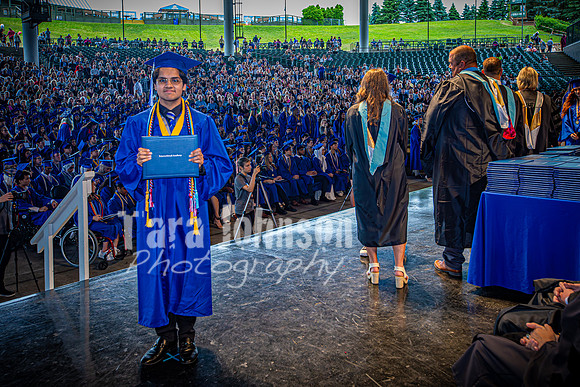 2024 IA Graduation - Diploma with audience behind - TJP (110 of 178)