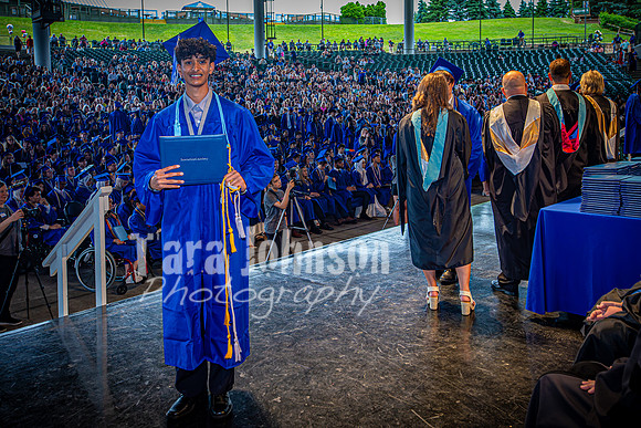 2024 IA Graduation - Diploma with audience behind - TJP (164 of 178)