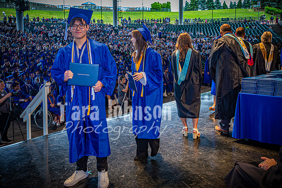 2024 IA Graduation - Diploma with audience behind - TJP (116 of 178)