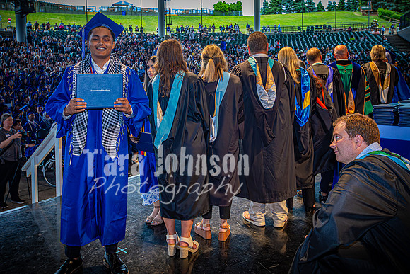 2024 IA Graduation - Diploma with audience behind - TJP (175 of 178)