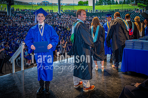 2024 IA Graduation - Diploma with audience behind - TJP (139 of 178)