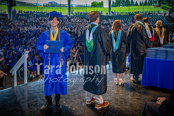 2024 IA Graduation - Diploma with audience behind - TJP (135 of 178)