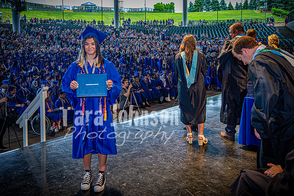 2024 IA Graduation - Diploma with audience behind - TJP (111 of 178)