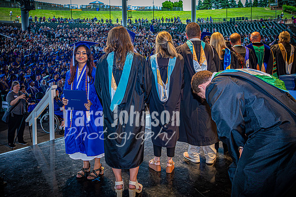 2024 IA Graduation - Diploma with audience behind - TJP (177 of 178)