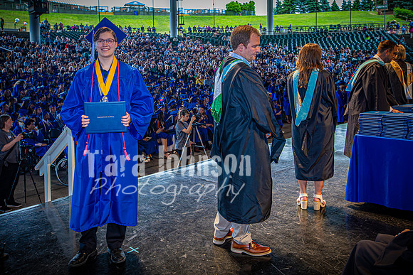 2024 IA Graduation - Diploma with audience behind - TJP (156 of 178)