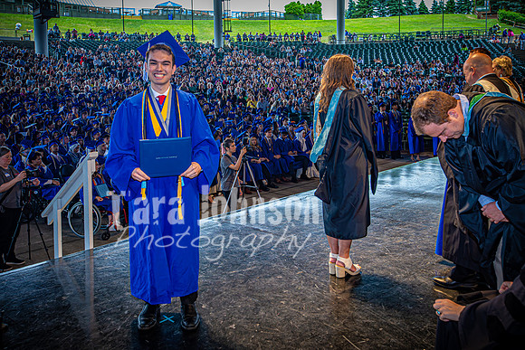 2024 IA Graduation - Diploma with audience behind - TJP (157 of 178)