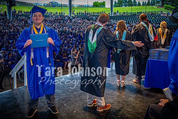 2024 IA Graduation - Diploma with audience behind - TJP (134 of 178)