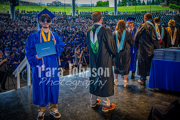 2024 IA Graduation - Diploma with audience behind - TJP (147 of 178)