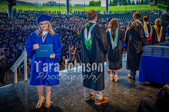 2024 IA Graduation - Diploma with audience behind - TJP (138 of 178)