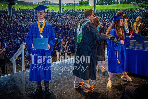 2024 IA Graduation - Diploma with audience behind - TJP (144 of 178)