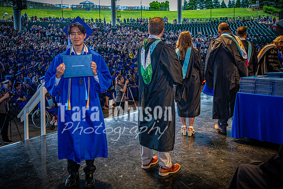 2024 IA Graduation - Diploma with audience behind - TJP (142 of 178)
