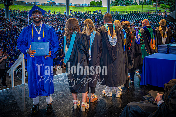 2024 IA Graduation - Diploma with audience behind - TJP (171 of 178)