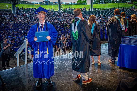 2024 IA Graduation - Diploma with audience behind - TJP (152 of 178)