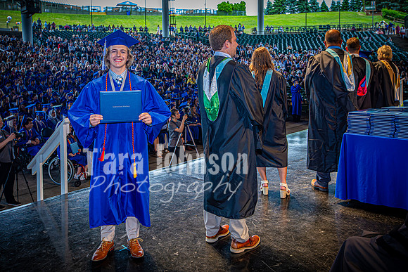 2024 IA Graduation - Diploma with audience behind - TJP (143 of 178)