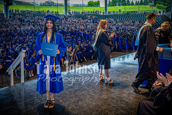 2024 IA Graduation - Diploma with audience behind - TJP (170 of 178)