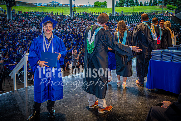 2024 IA Graduation - Diploma with audience behind - TJP (132 of 178)