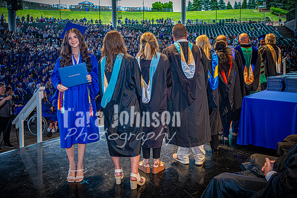 2024 IA Graduation - Diploma with audience behind - TJP (172 of 178)