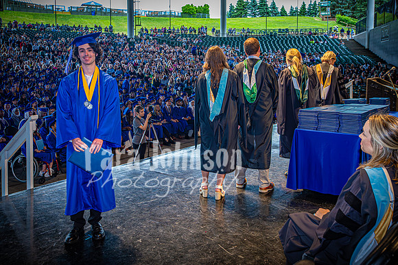 2024 IA Graduation - Diploma with audience behind - TJP (98 of 178)
