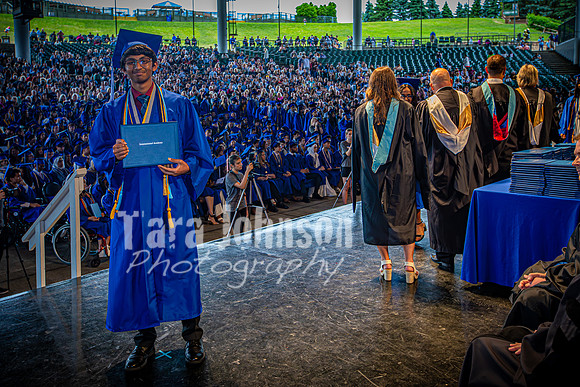 2024 IA Graduation - Diploma with audience behind - TJP (168 of 178)